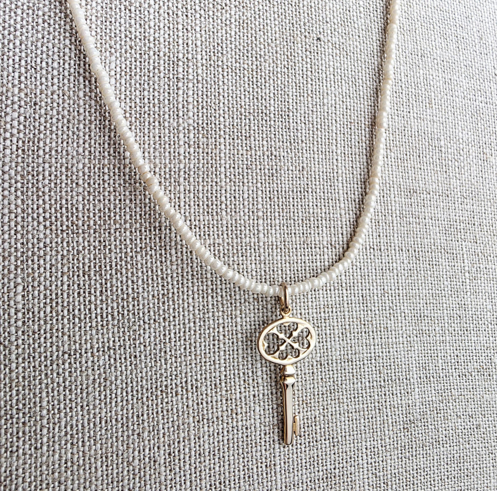 Gold Bronze Skeleton Key Pendant Necklace, Pearly Ivory Glass Seed Bead Chain, 14K Gold Filled Clasp