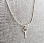 Gold Bronze Skeleton Key Pendant Necklace, Pearly Ivory Glass Seed Bead Chain, 14K Gold Filled Clasp