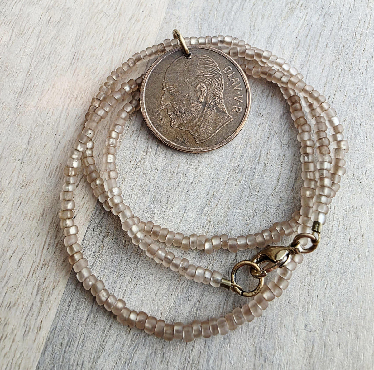 1966 Norge Norway Moose Coin Necklace, 5 Ore, Frosted Light Brown Glass Seed Bead Chain, Brass Lobster Claw Clasp, Made in USA