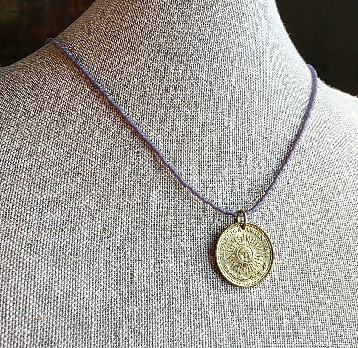 1978 Argentina Gold Sun Coin Necklace, Matte Purple Glass Seed Bead Chain, Solid Brass Clasp, Gift Boxed, Made in USA by E. Ria Designs